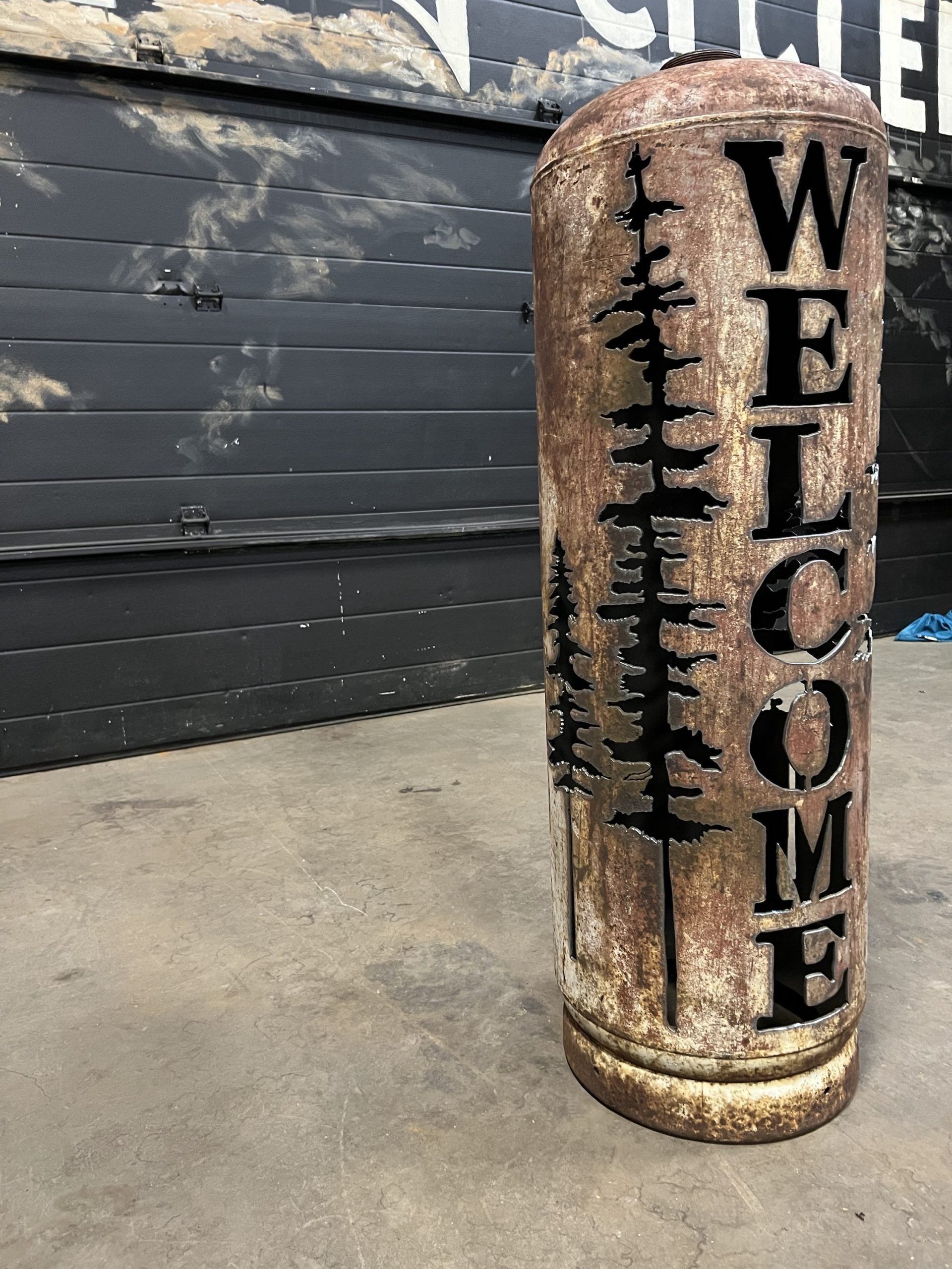 100lb Upcycled Patio Lantern, Welcome & Spruce Trees
